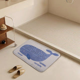 Coral velvet bathroom rug with blue whale design, non-slip and absorbent for bathroom