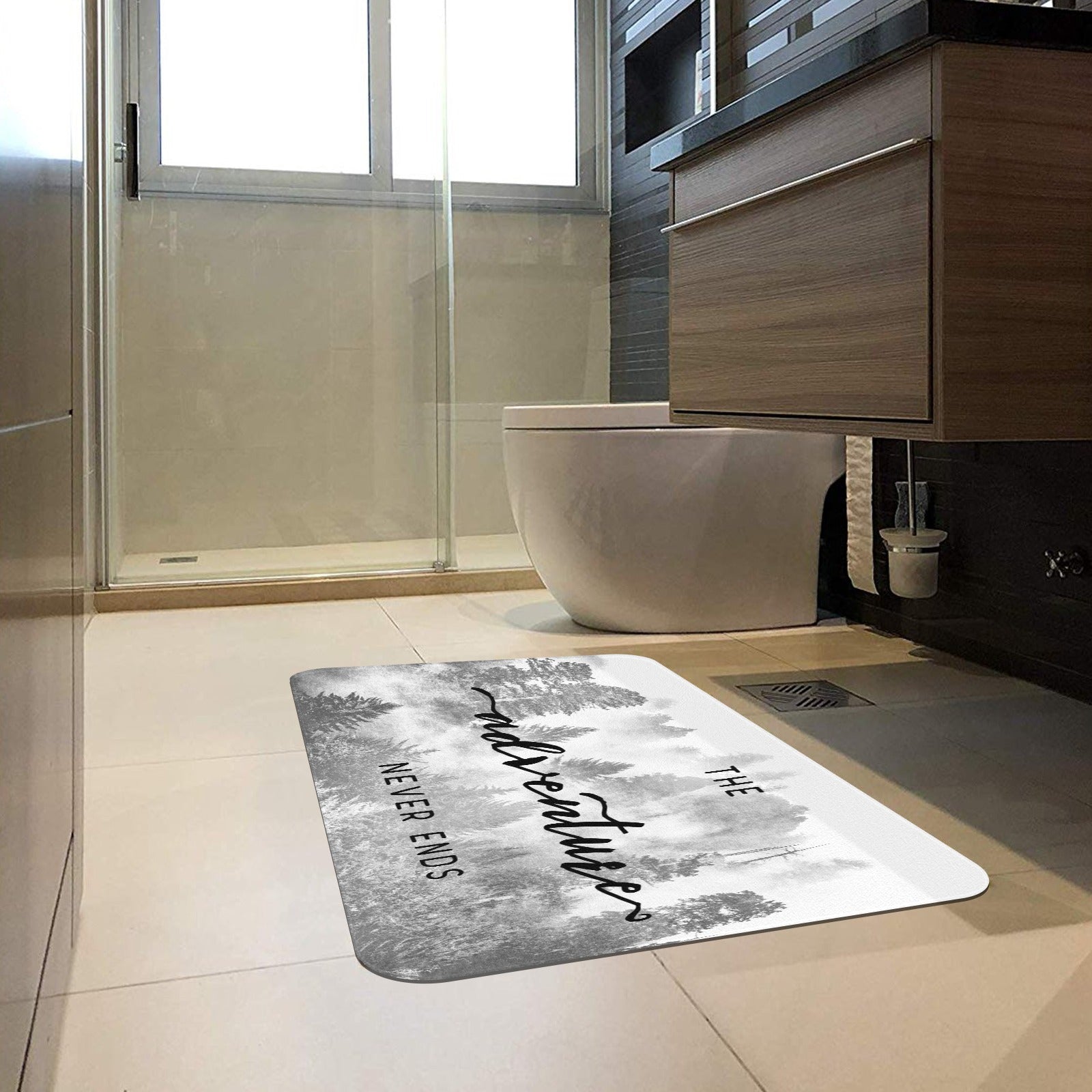 Forest entrance doormat with "The Adventure Never Ends" quote, rubber floor mat for bathroom decor.