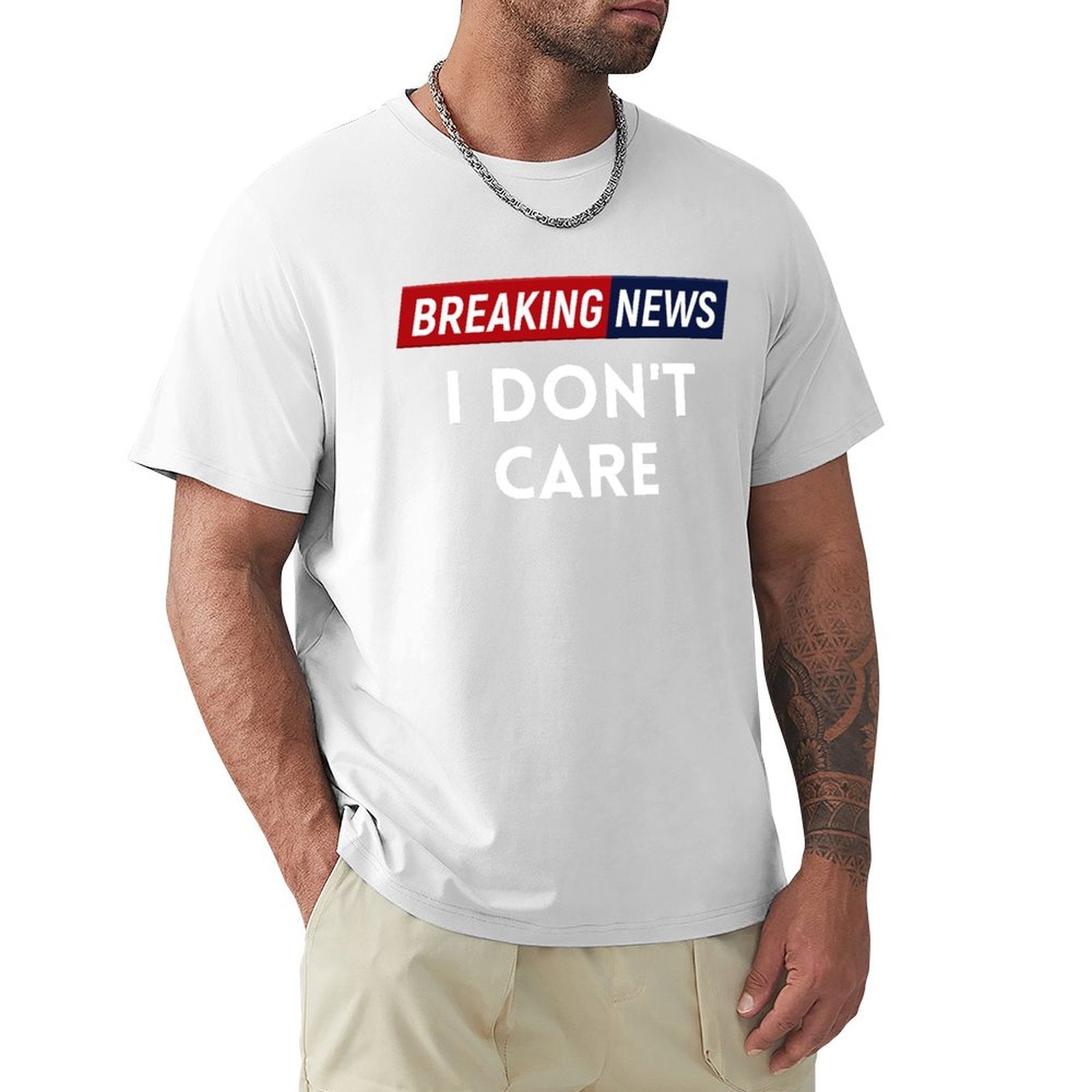 Men's white crew neck t-shirt with "BREAKING NEWS I DON'T CARE" print, classic cotton tee
