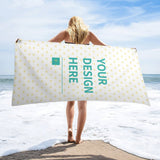 Custom beach towel with heart pattern, personalized design, held by a woman on a beach. Beach accessories from MyArtsyGift.