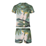Boys' rash guard set: Parrot design short sleeve swim shirt & swim trunks. Polyester/spandex, perfect for swimming.