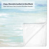 Beach-themed flannel blanket with ocean design, soft polyester, offers class, warmth, and comfort, perfect for couch or bed