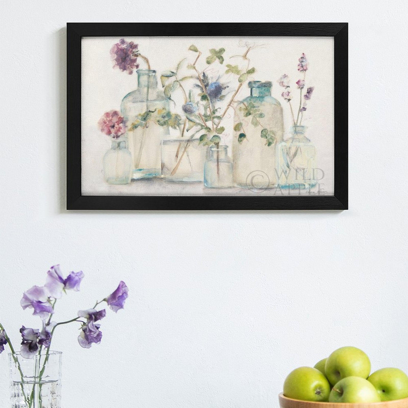 Floral canvas print with black frame, featuring watercolor blossoms in glass jars, minimalist wall decor, made in USA.