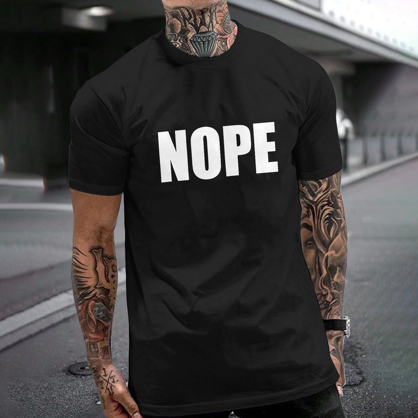Black Gildan unisex "NOPE" T-shirt. Comfortable cotton tee for casual wear available on MyArtsyGift.com.