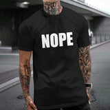 Black Gildan unisex "NOPE" T-shirt. Comfortable cotton tee for casual wear available on MyArtsyGift.com.