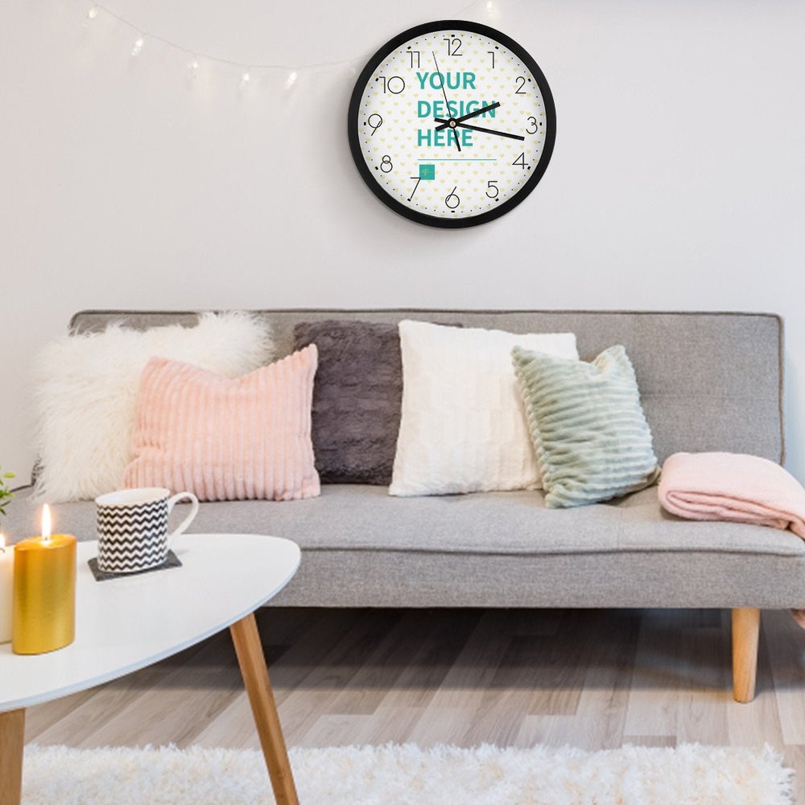 Customizable round clock with 'YOUR DESIGN HERE' text and black frame, home decor