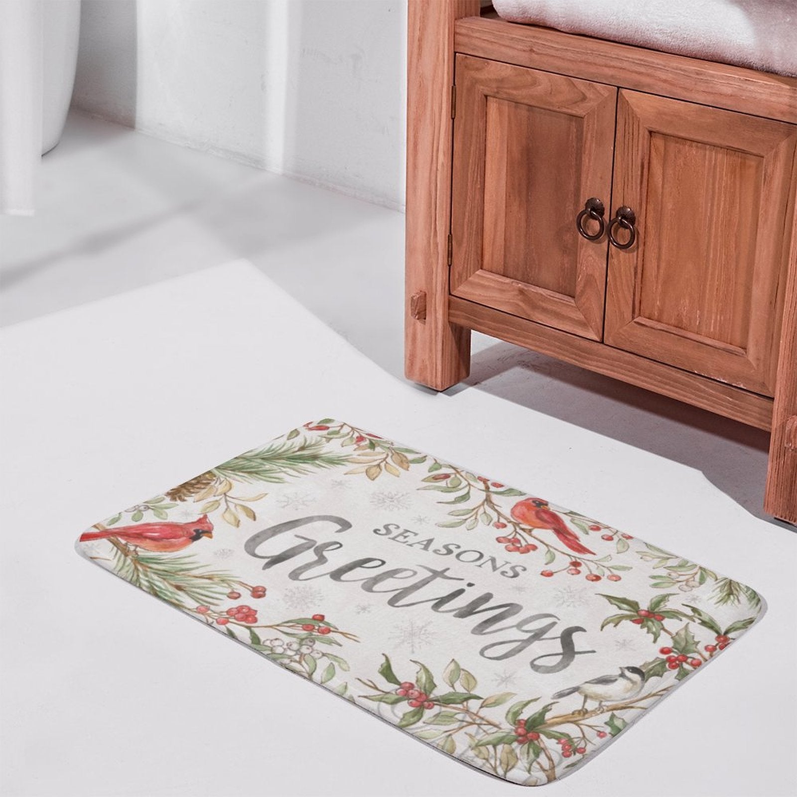Seasons Greetings coral velvet bath rug for bathroom, with cardinals and festive design.