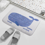 Coral velvet whale bath rug with a blue whale design, perfect for bathroom and kitchen
