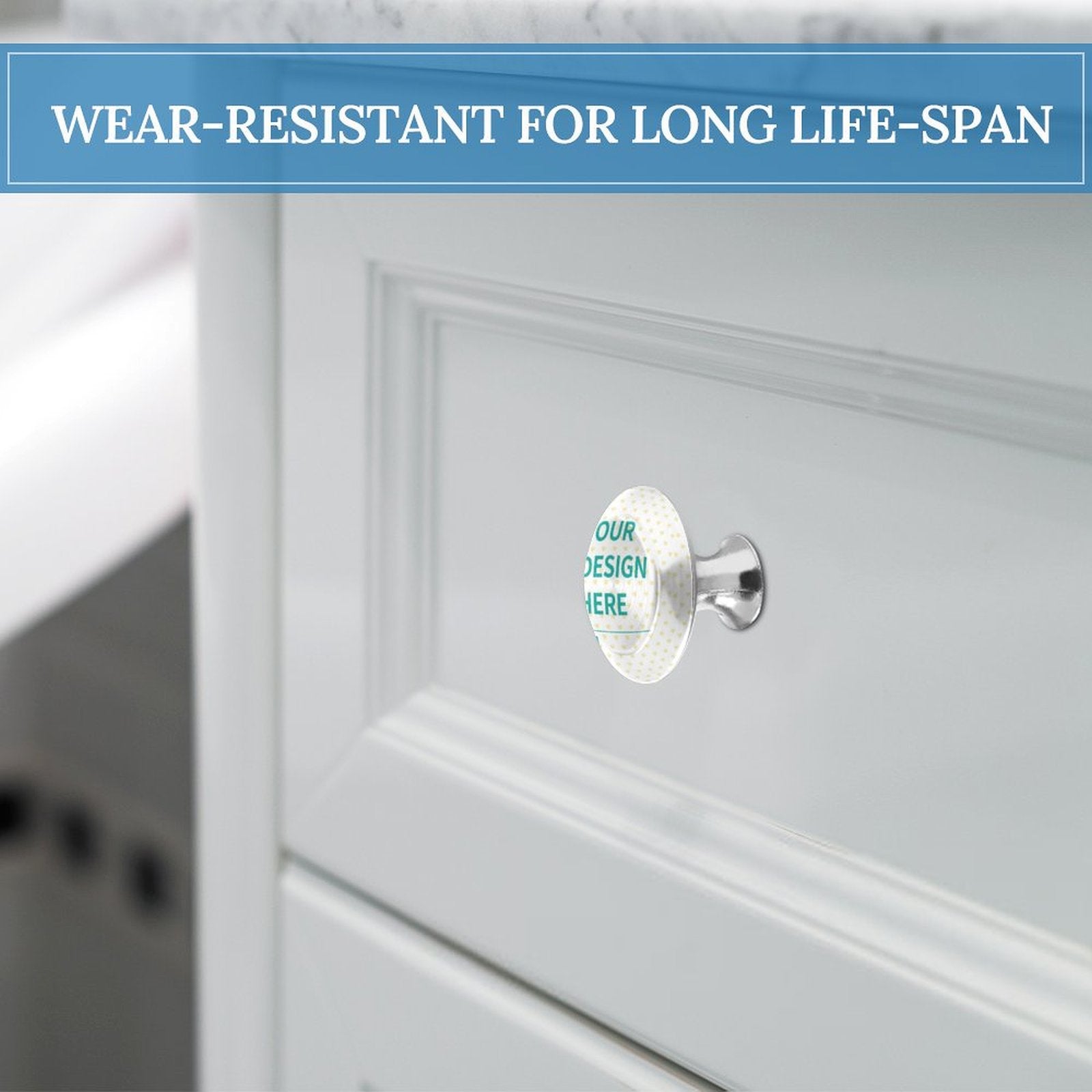 Custom drawer pull with "OUR DESIGN HERE" design, stainless steel, wear-resistant for long life-span, on white cabinet