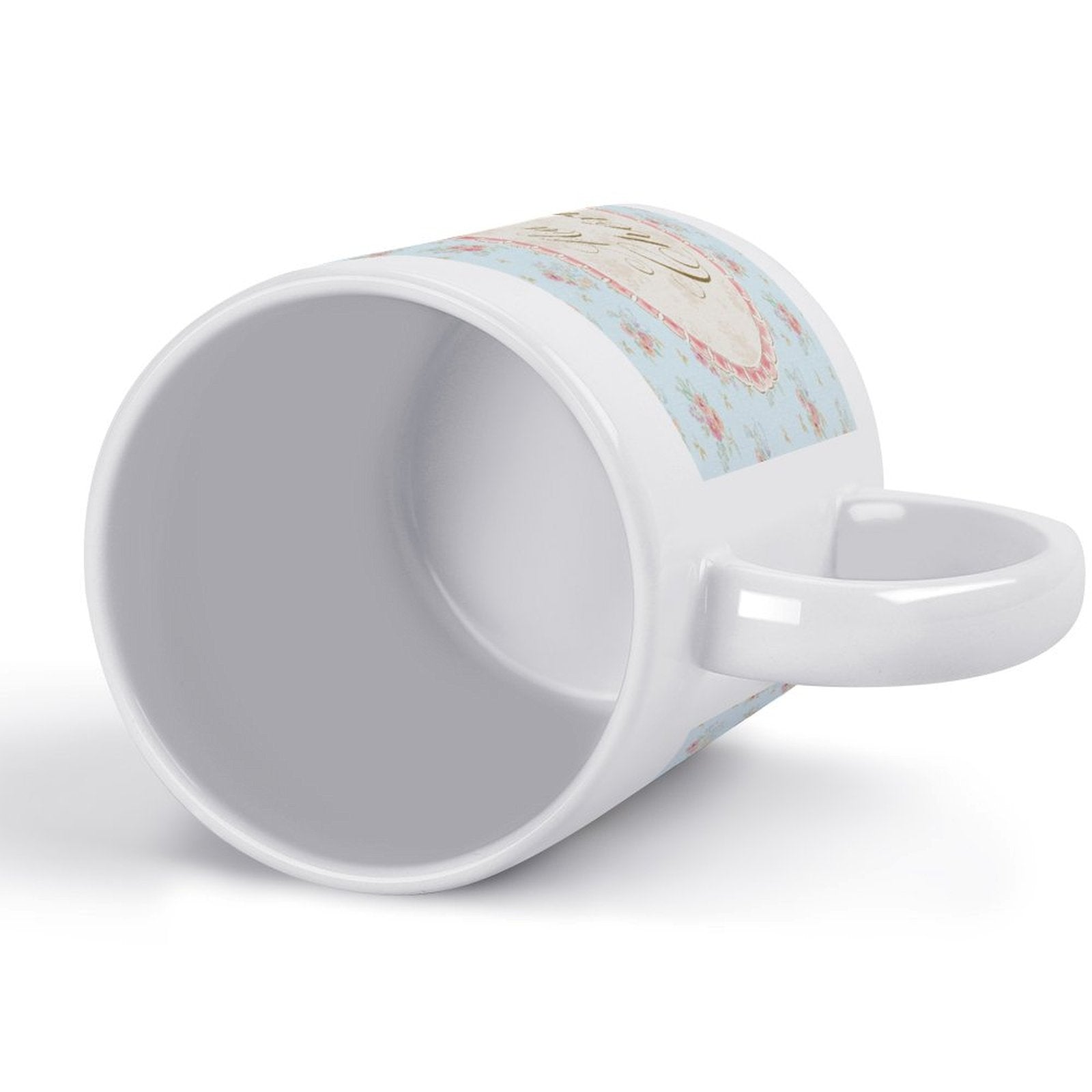 White ceramic personalized coffee mug with floral design and text, perfect gift for any occasion.
