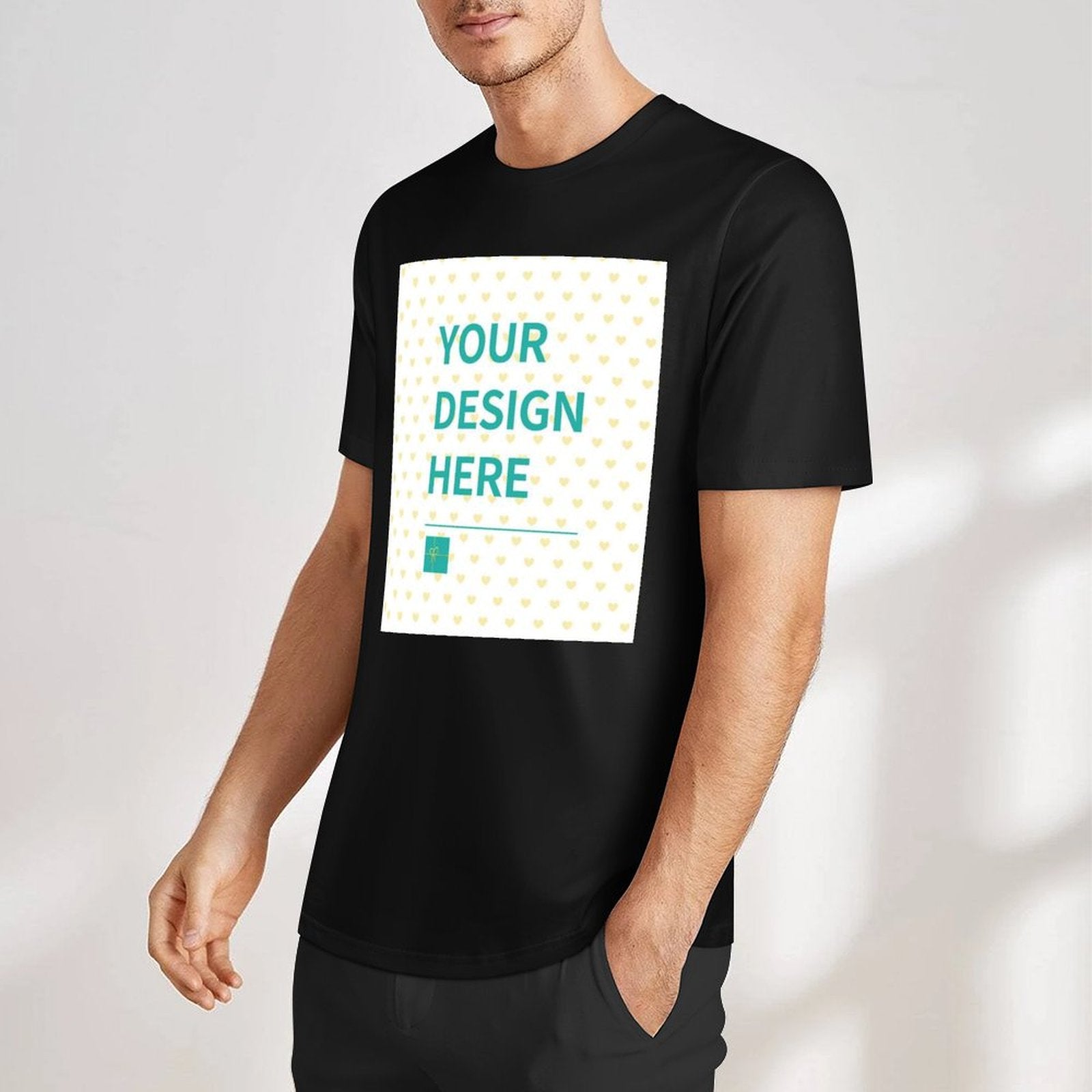 Custom black cotton t-shirt with YOUR DESIGN HERE text, perfect for personalized gifts.