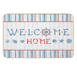 Nautical welcome home floor mat. Striped blue and red design with seashells and ship wheel. Washable doormat