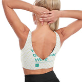 Custom women's sports bra with "YOUR DESIGN HERE" design, white with yellow heart patterns, perfect for workouts.