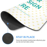 Customizable gaming mouse pad, showing the non-slip rubber base, with 'YOUR DESIGN HERE' text on a white surface.
