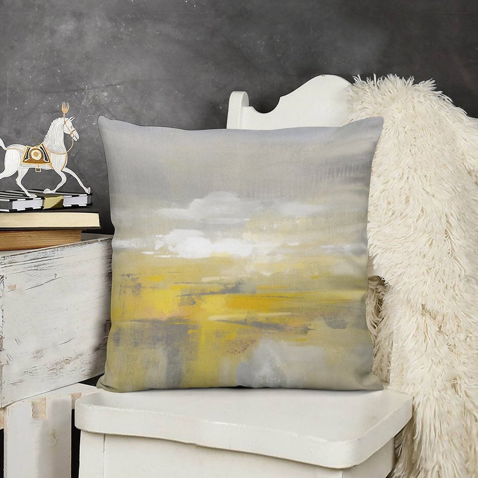 Abstract art plush pillow cover with yellow, grey, and white hues on a white chair, perfect for sofa or couch.