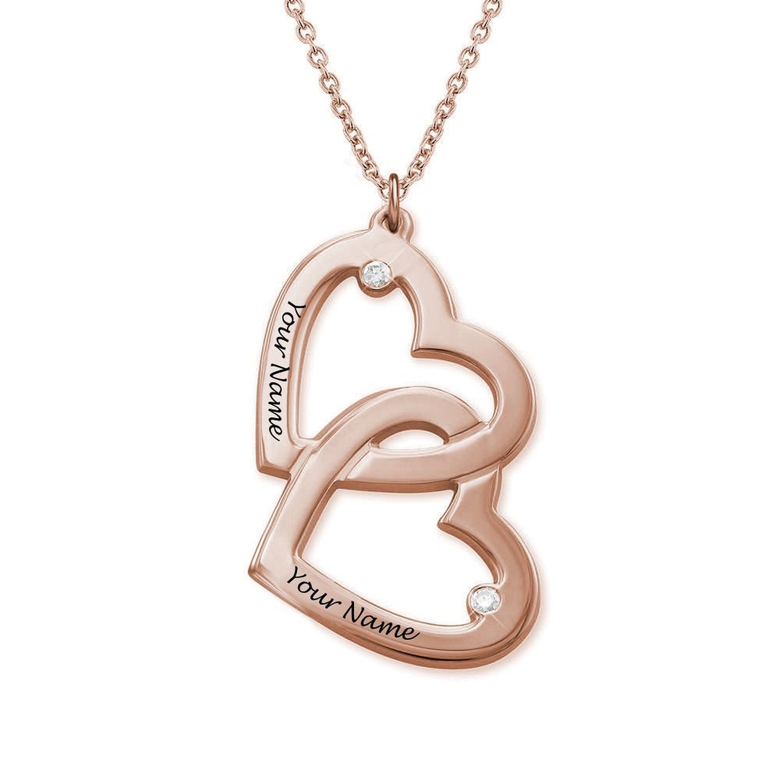 Personalized rose gold double heart necklace with engraved name, diamond accents, custom gift.