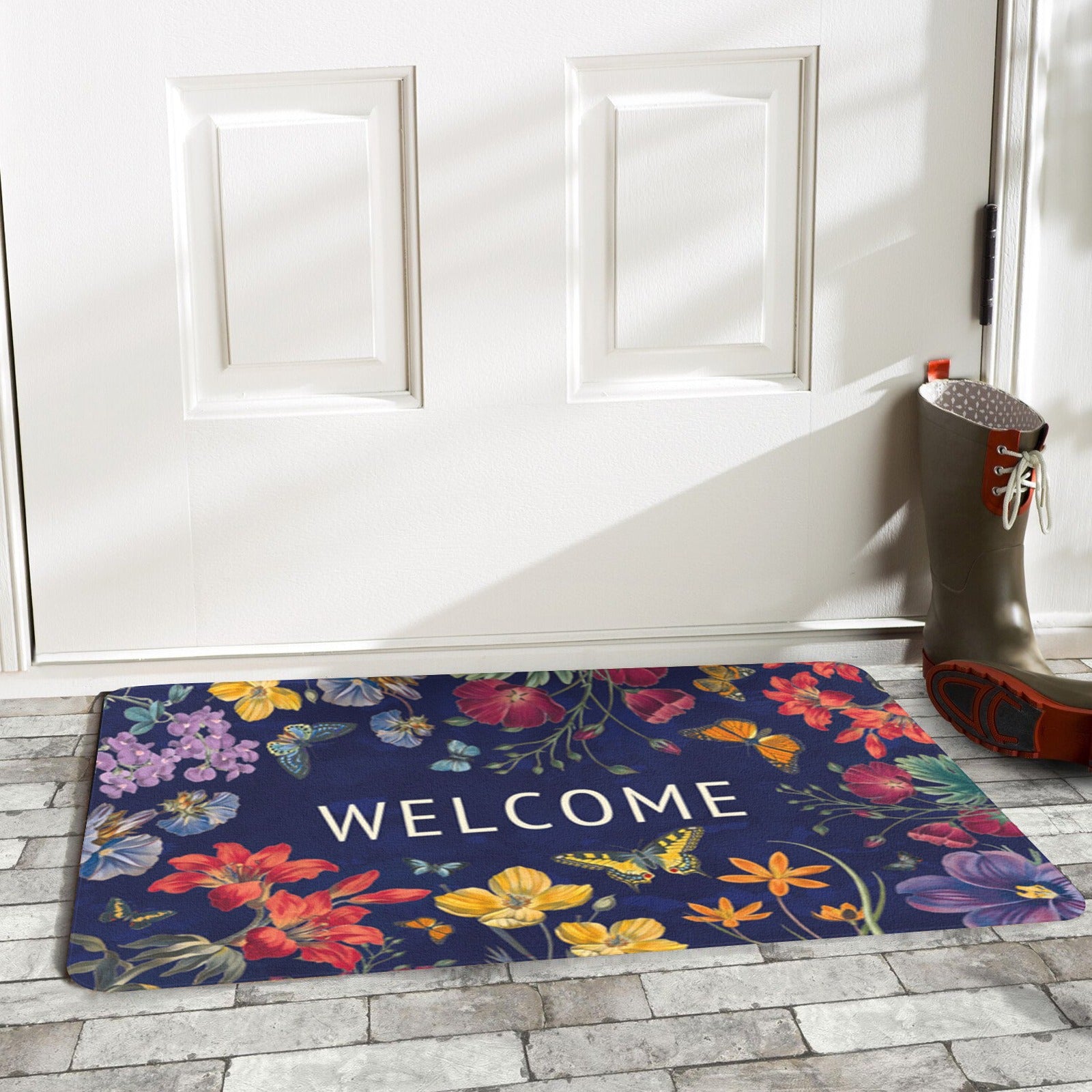 Butterfly and floral welcome door mat, dark blue with floral design, suitable for indoor and outdoor use.