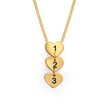 Gold heart pendant necklace with custom numbers 1, 2, 3. Personalized chain necklace from MyArtsyGift