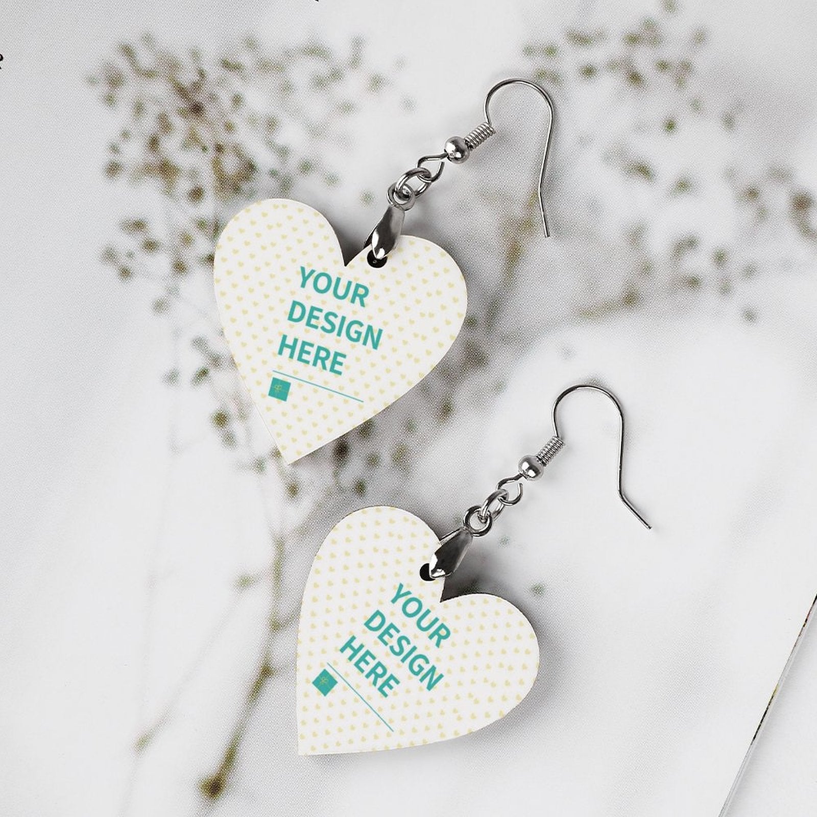 Custom heart drop earrings with personalized design, wood and metal detail.
