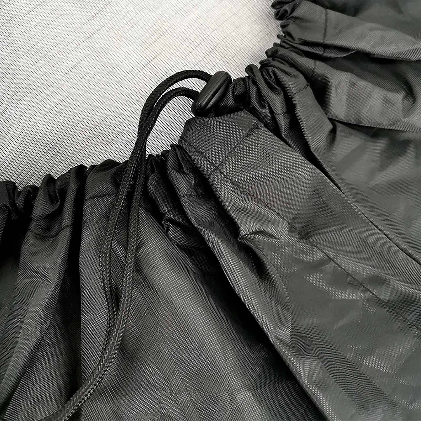 Black tire cover with drawstring closure for RV and SUV tire protection. Waterproof and durable wheel cover.