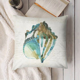 Seashell plush pillow cover. Watercolor design for sofa or couch, with a book in the background.