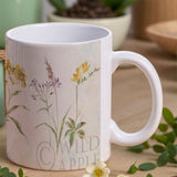 White ceramic mug with wildflower design, perfect for home or office use.