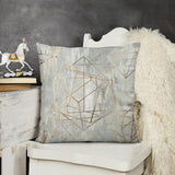 Gray plush throw pillow cover with gold geometric pattern. Decorative pillow for sofa and living room.