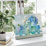 Canvas print of blue hydrangeas and white roses in glass jars, wall decor.