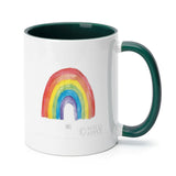 White ceramic Pride mug with rainbow design, green inner color, from MyArtsyGift, customizable gift. Pride. Wild Apple.