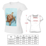 White women's t-shirt with sea turtle design graphic, includes size chart with measurements.