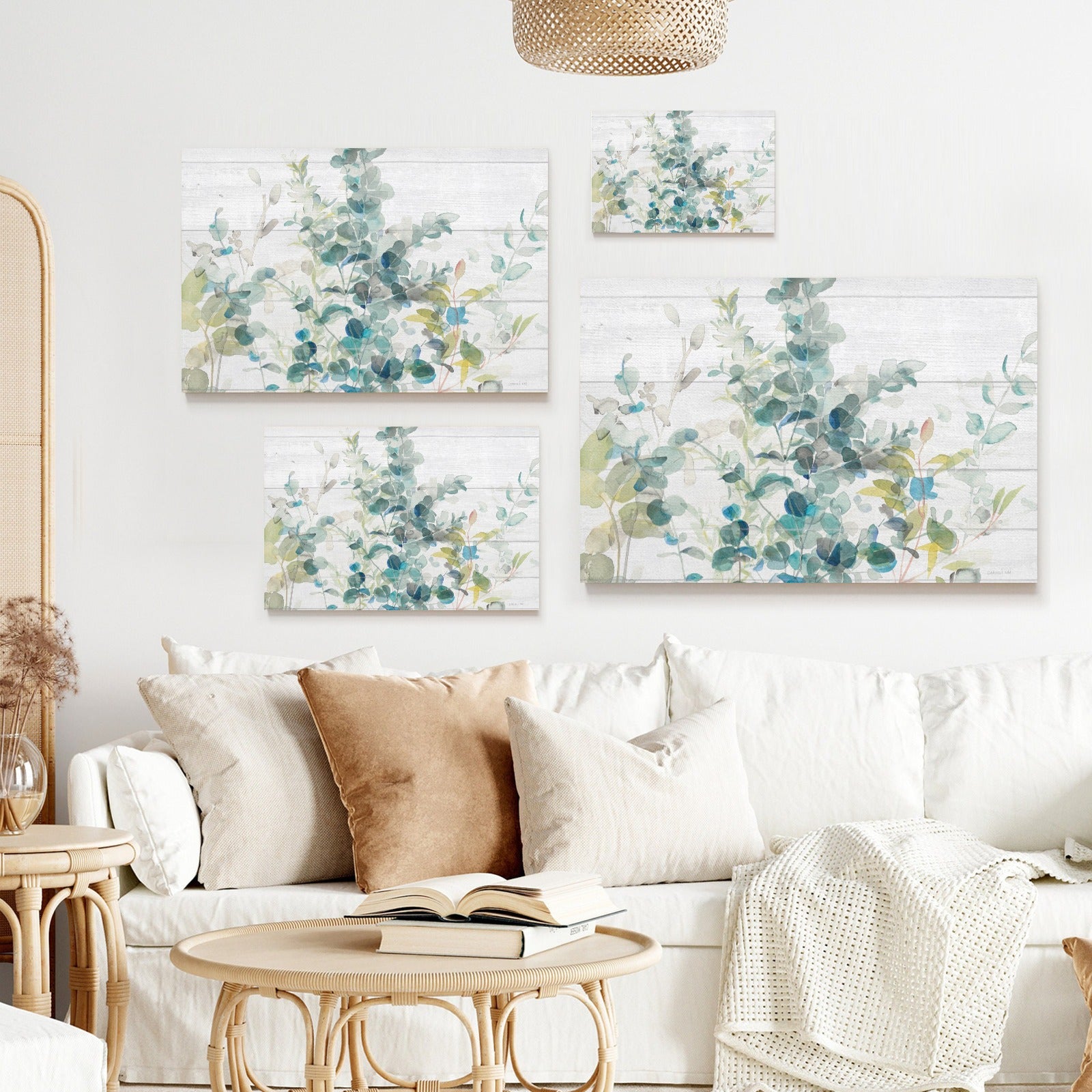 Eucalyptus I on Shiplap Canvas Print set in a modern living room; Watercolor art with green and blue leaves for home decor.
