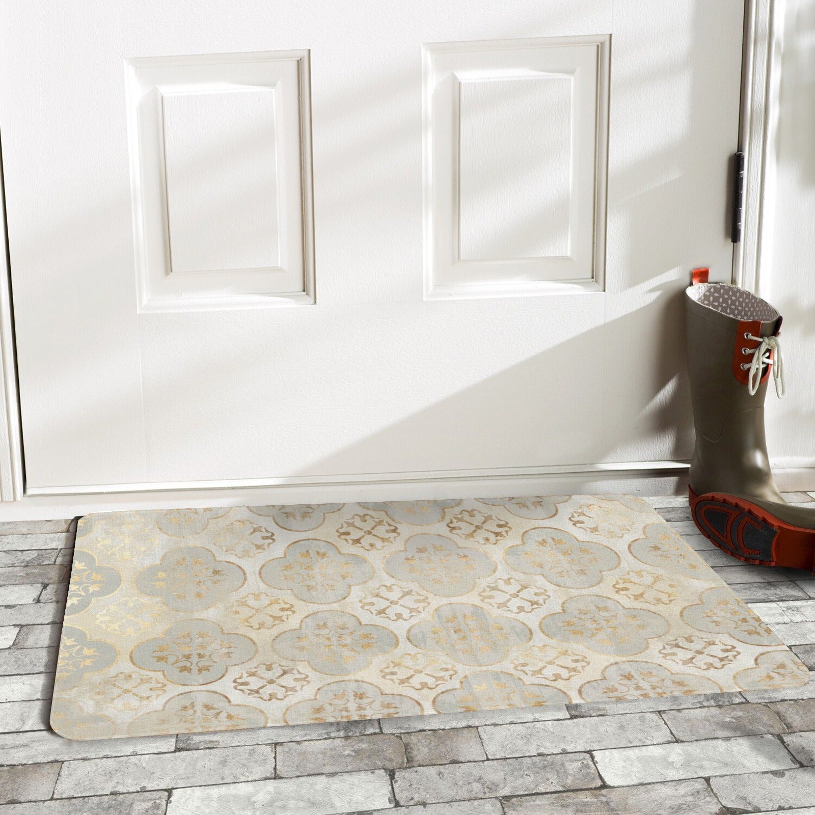 Boho entrance doormat with quatrefoil design; gold, cream, and gray color scheme for indoor or outdoor use.