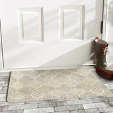 Boho entrance doormat with quatrefoil design; gold, cream, and gray color scheme for indoor or outdoor use.