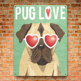 Metal Pug Love wall art with heart sunglasses on a red brick wall