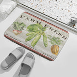 Coral velvet bathroom rug with farm fresh vegetables, radishes, snap peas, carrots. Non-slip bath mat