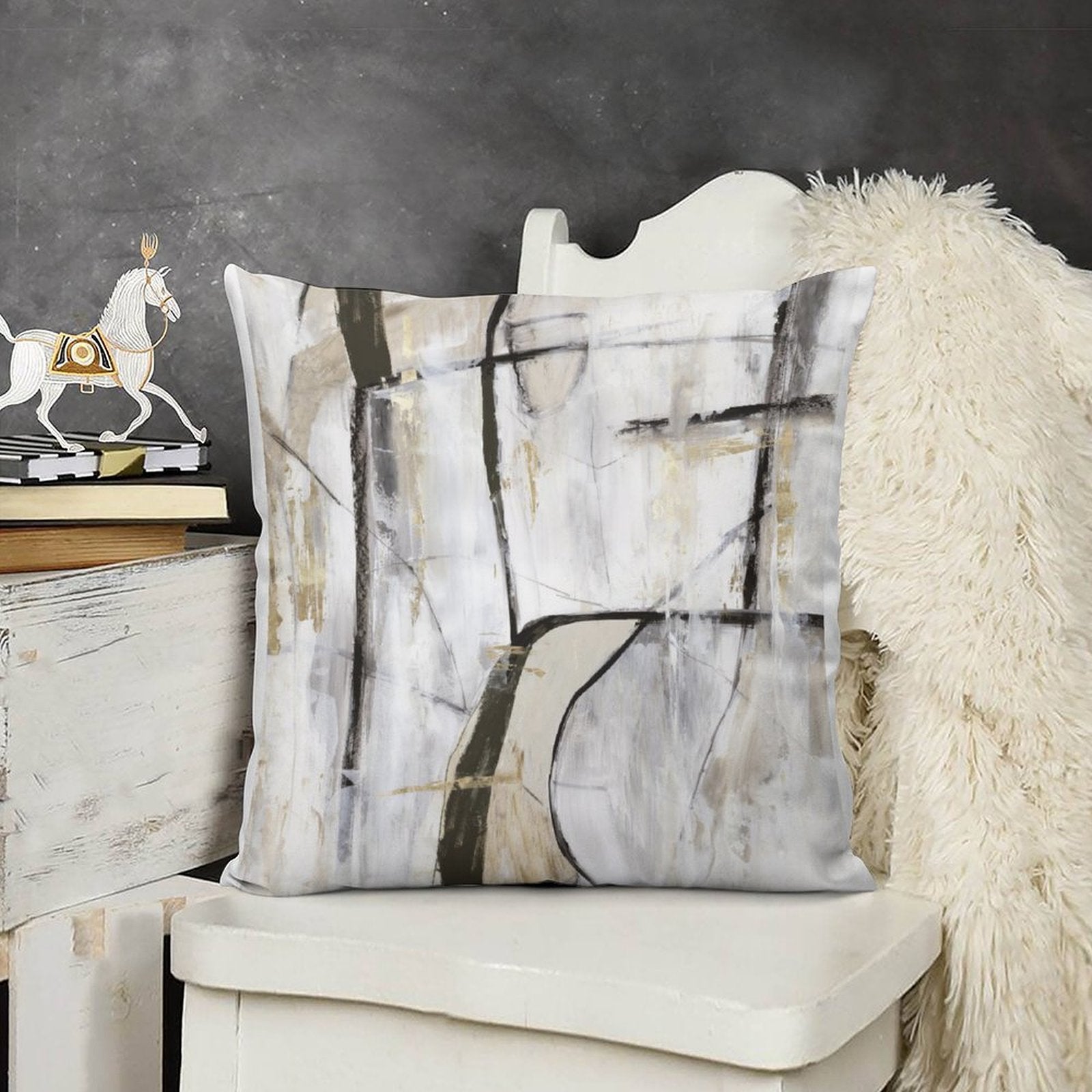 Abstract art throw pillow cover in neutral tones on a white chair for home decor