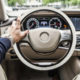 Neoprene car steering wheel cover with yellow polka dots on a car interior, car accessories for most vehicles