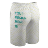 Customizable kids' swim trunks with white fabric and yellow hearts, featuring 'YOUR DESIGN HERE' text