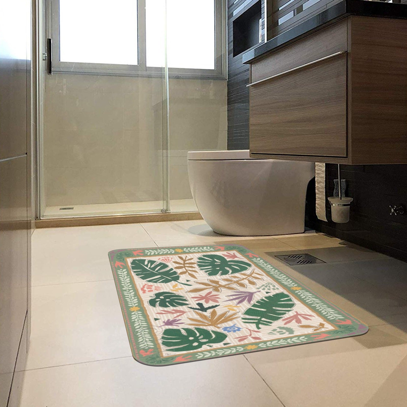 Desert-themed rubber floor mat with tropical leaf design, perfect for bathroom use