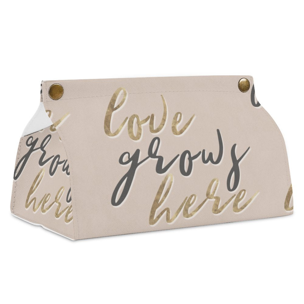 Beige PU tissue box cover with 'Love Grows Here' design, ideal for home or office decor.