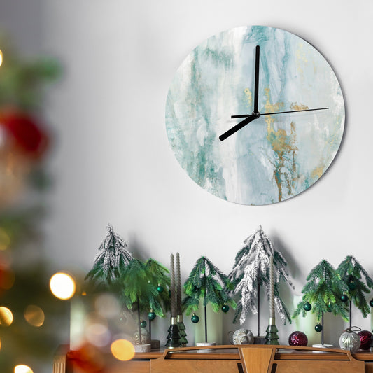 Modern blue MDF wall clock for living room decor with gold accents, displayed with Christmas decorations.