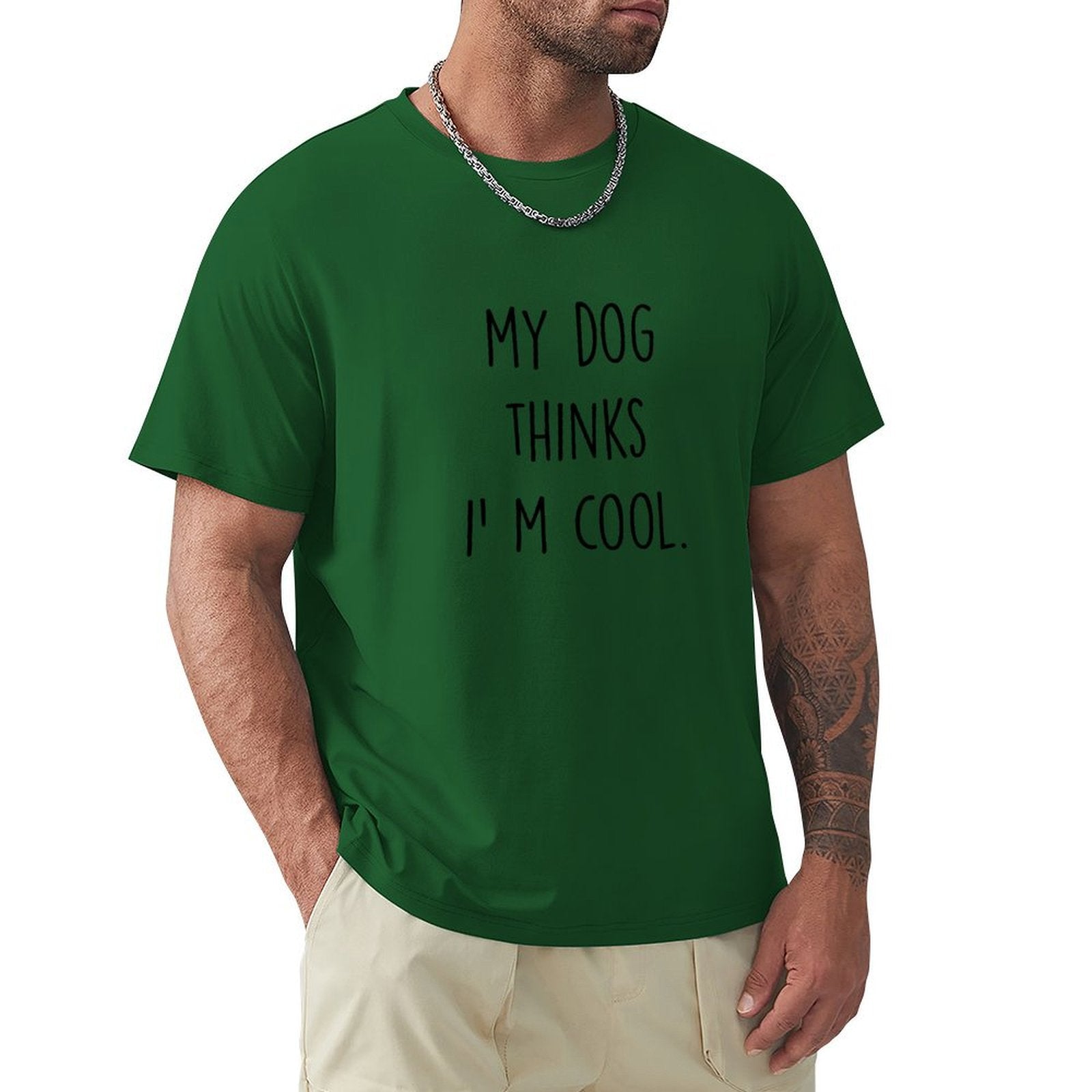 Men's green short sleeve crew neck t-shirt with 'My Dog Thinks I'm Cool' print, cotton tee.