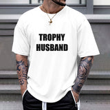 White Gildan Unisex TROPHY HUSBAND T-shirt. Cotton fabric, perfect gift for husband. Comfortable and stylish apparel.