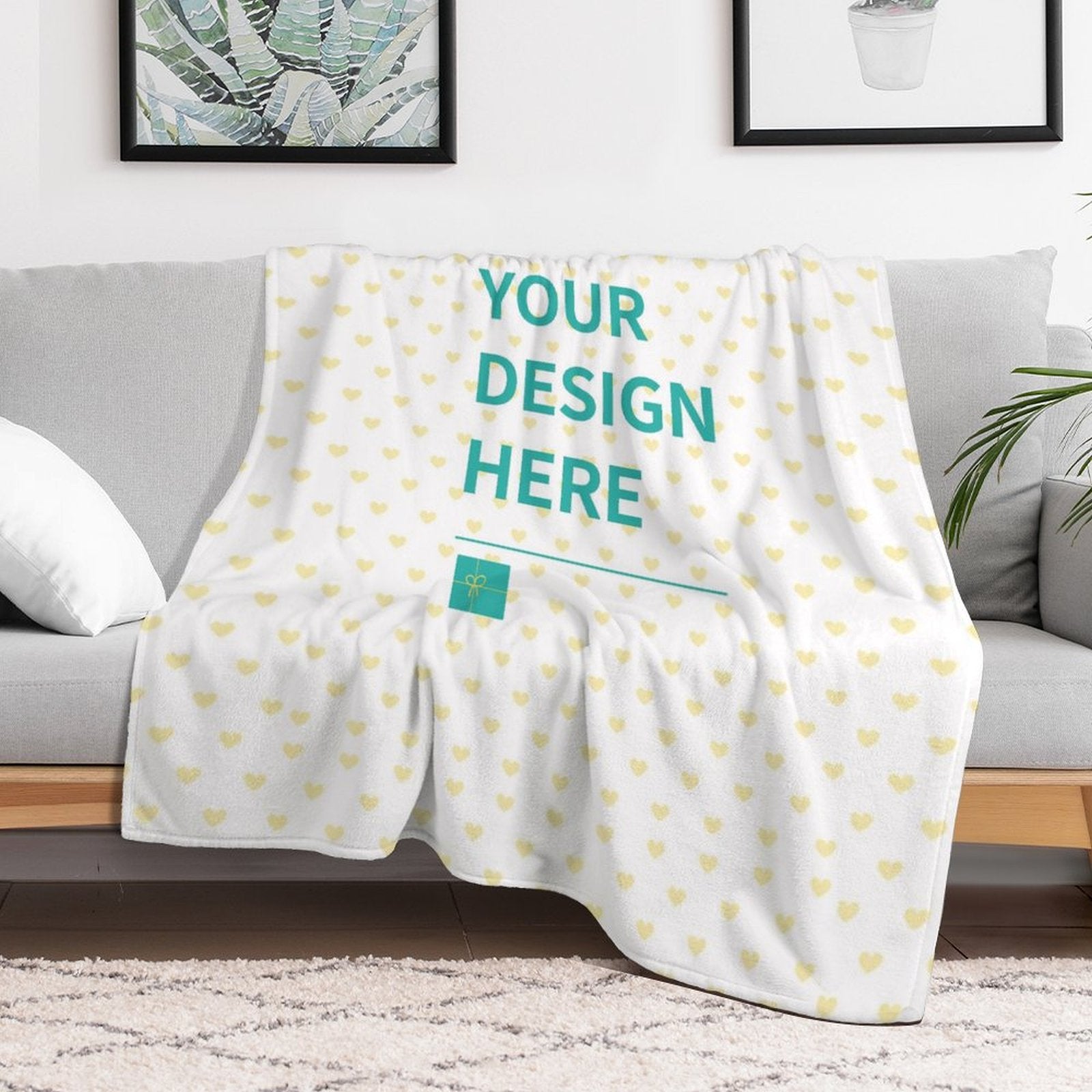 Customizable fleece blanket with heart pattern, saying 'YOUR DESIGN HERE'. A soft, cozy blanket perfect for bed or sofa.