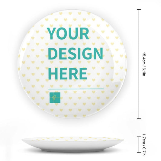 Customizable bone china plate with "YOUR DESIGN HERE" text, heart pattern, and gift icon, personalized decorative plate