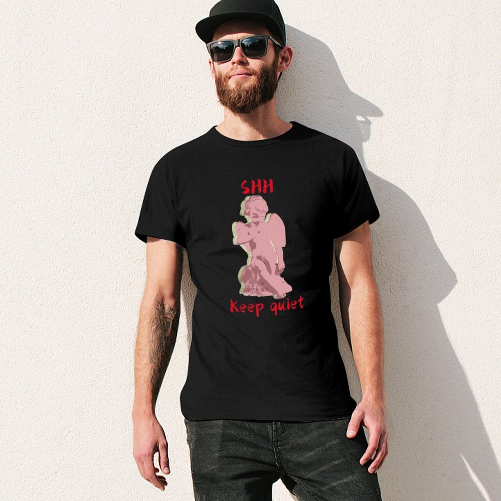 Black men's crew neck t-shirt with pink angel graphic and "SHH Keep quiet" text print
