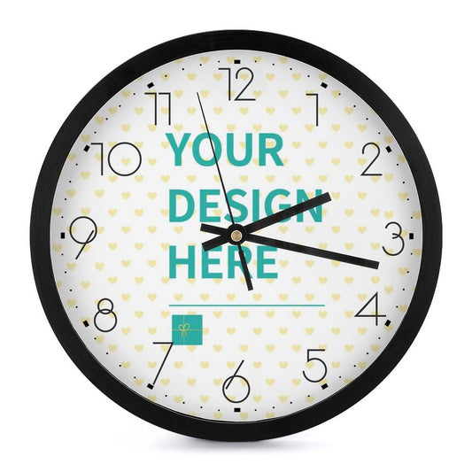 Customizable round wall clock with black frame, text says 'YOUR DESIGN HERE', perfect for home decor.