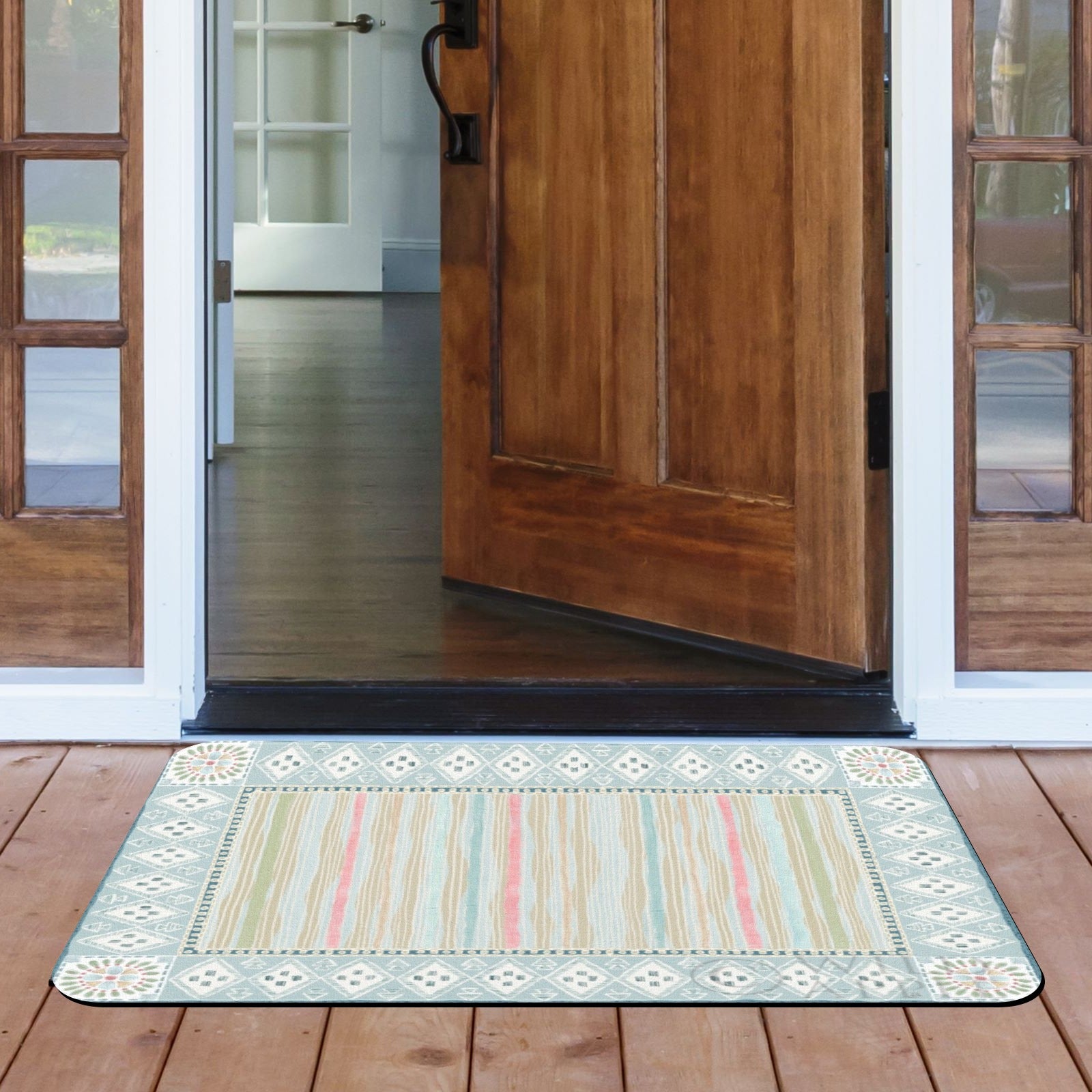 Geometric door mat with pastel stripes at a wooden door entrance, for indoor or outdoor use