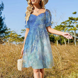 Women's summer mini dress, blue watercolor print, short sleeves, and casual style