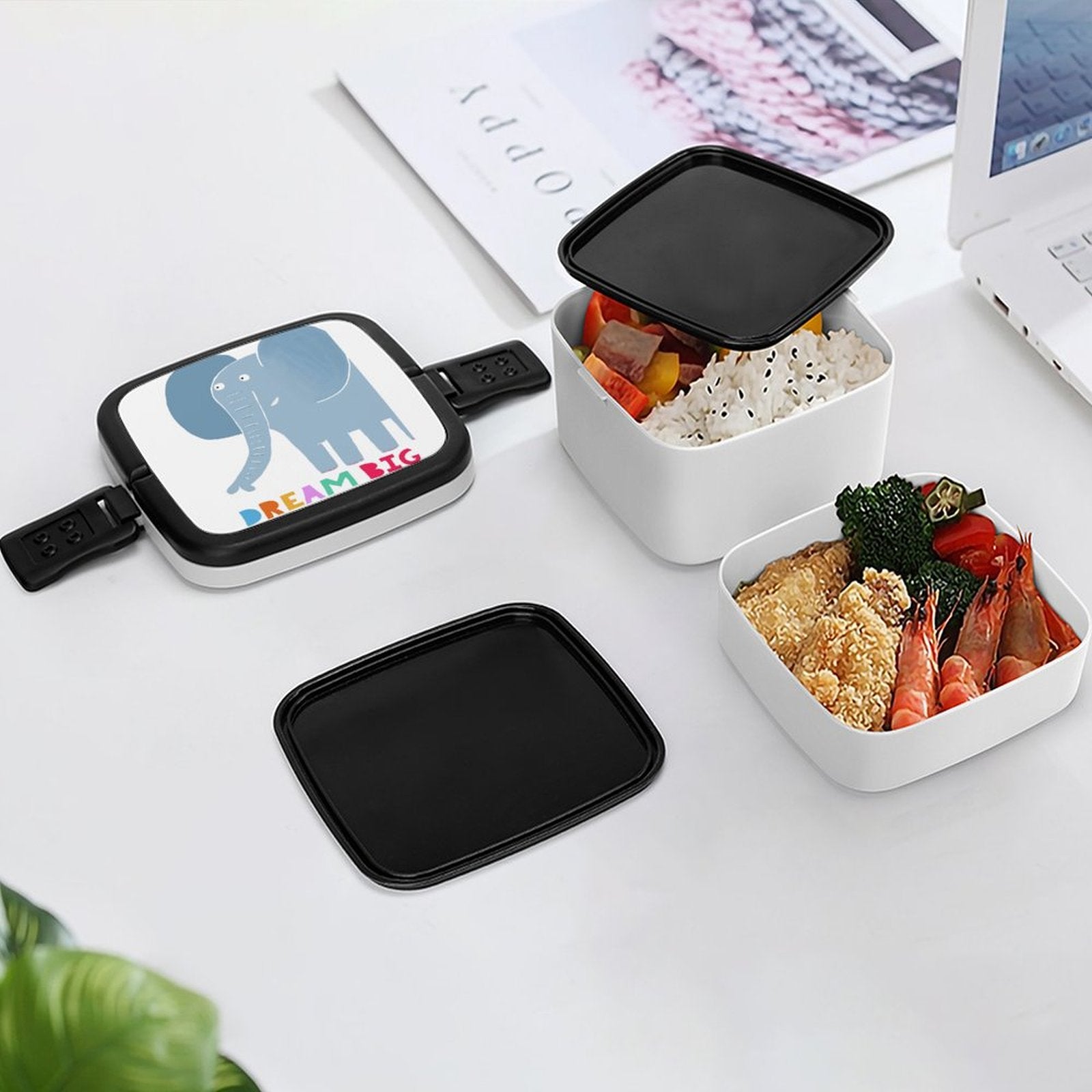 Kids' double-layer bento lunch box with elephant design and DREAM BIG text, white container with food, perfect for school